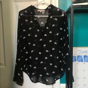 A black and white heart print blouse